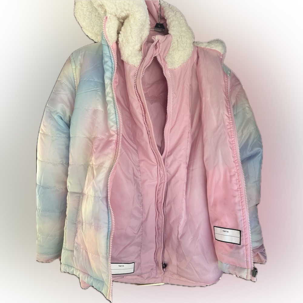 Reebok Girl reversible jacket.
Size 10/12